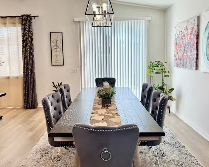 Shared dining table set beside the living area
