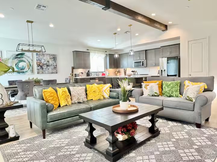Landon House shared living room with comfortable seating and an open kitchen